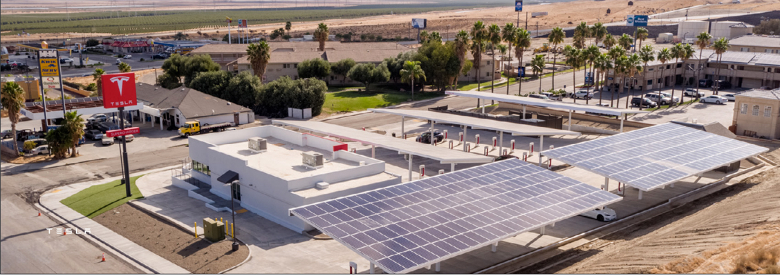 aerial photo of a Tesla supercharger station